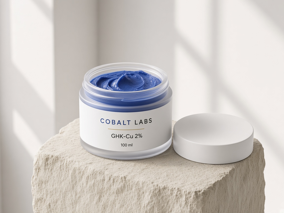 Open Cobalt Labs jar showing cobalt blue GHK-Cu cream and a white lid